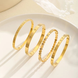 Elegant geometric star 18K gold bangle