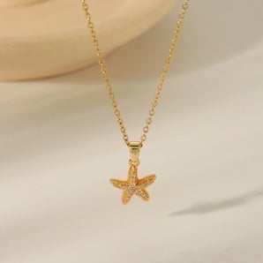 Beach starfish shell pendant necklace, gold-plated.