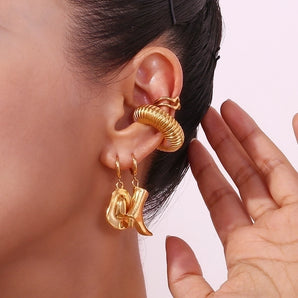 Vintage asymmetrical hat boots gold-plated earrings.